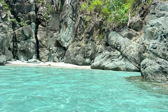 Amazing Half Day Private Boat Charter on Luxury Sailing Catamaran - The first hour: fruit, pastries, and island views